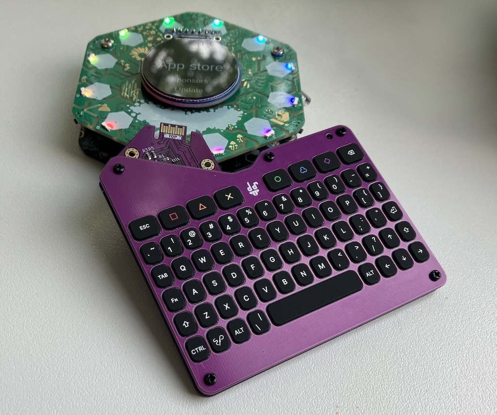 A photograph of a small keyboard that plugs into the Tildagon badge.