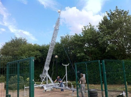 A radio mast being erected