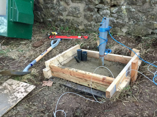 Base of the network cabinet being installed